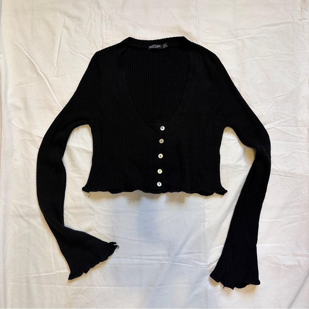 Cropped black sweater top.